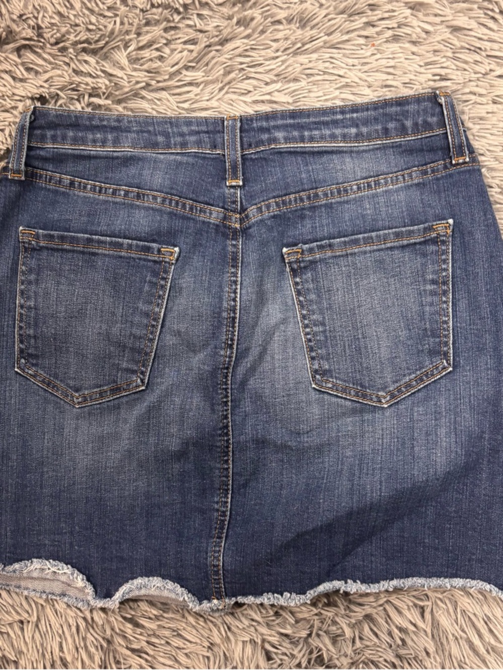 Washed Blue Denim Mini Skirt with Frayed Hem - Size small. Perfect for summer.